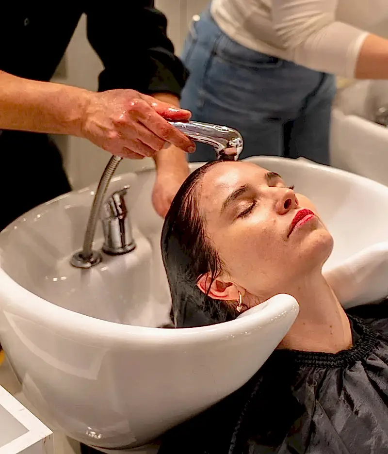 Professional keratin treatment application at Pink Lime Vancouver